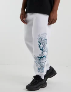 DRAGON EMBROIDERED BAGGY TRACK PANTS IN WHITE